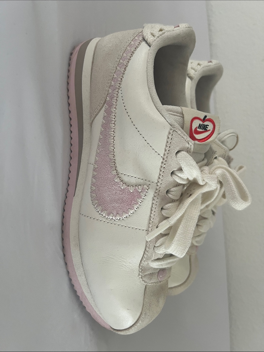 Nike Women’s Retro Runner Sneaker in White and Light Pink